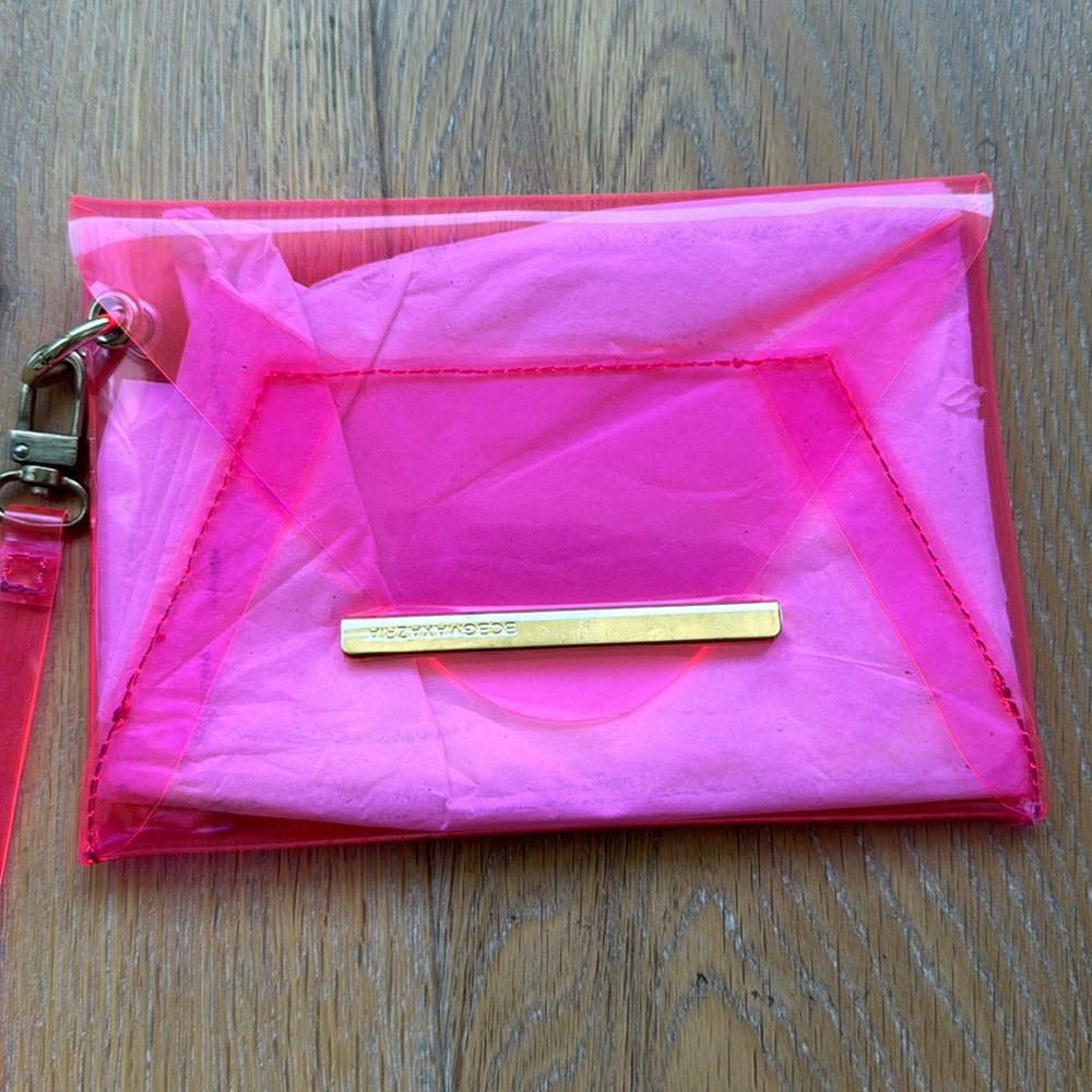 BCBGMaxAzria Harlow mini envelope wristlet translucent hot pink